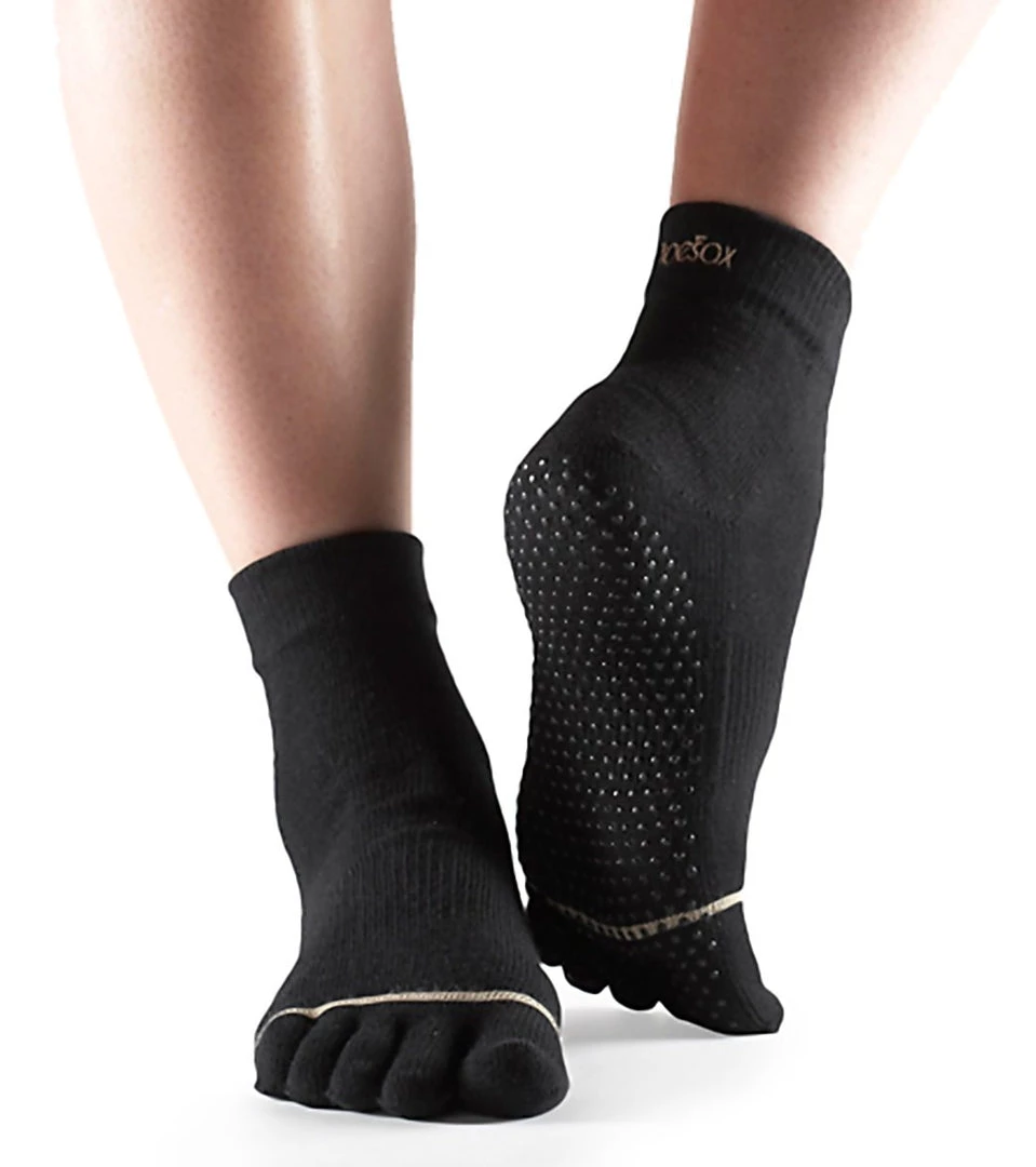 CLOTHING Toesox Ankle Length Full-Toe Yoga Grip Socks Black 5 CLOTHING Toesox Ankle Length Full-Toe Yoga Grip Socks Black