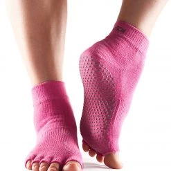 Toesox Ankle Length Half-Toe Yoga Grip Socks Hot Pink