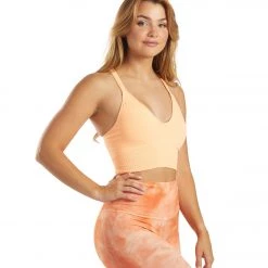 NEW ARRIVALS Free People Movement Good Karma Crop Yoga Top Peach